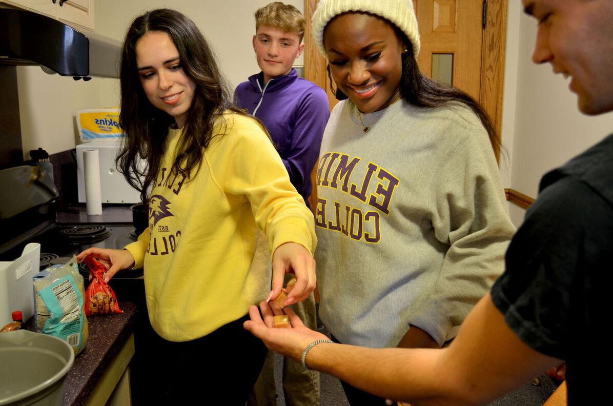 A group of students get ready to bake some cookies in a residence hall kitchen
